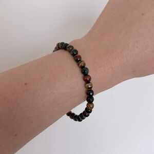 82. Mix tigers eye bracelet size 7 or smaller